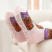 Load image into Gallery viewer, The Foozie™ Chocolate slipper socks, close-up of the soles showing the foozie grips
